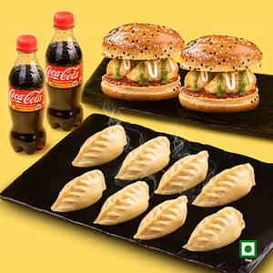 Veg Himalayan Steam Momo 8Pc + Veg Moburg 2Pc + 2 Coke 250ml