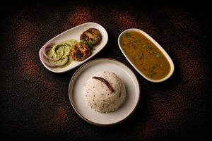 2 Chicken Chapli Kebab With Dal Tadka & Jeera Rice Combo
