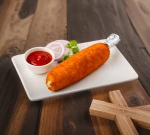 Chicken-cheese kulfi with tomato sauce  and onion