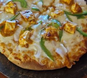 Paneer loaded pizza