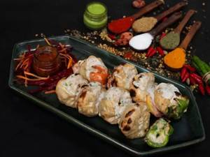 Afghani veg momos (8 Pieces)