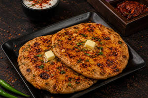 2 Chings Schezwan Aloo Paratha With Amul Masti Dahi [1 Cup, 85 GM].
