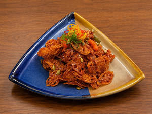 Honey Chilli Lotus Stem With Pumpkin Seeds
