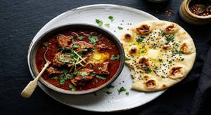 Mutton Roganjosh With Butter Naan