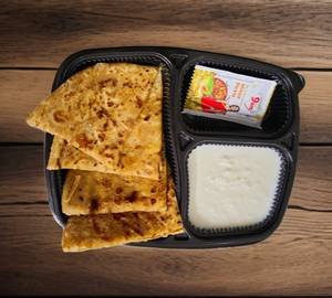 Aloo paratha with curd
