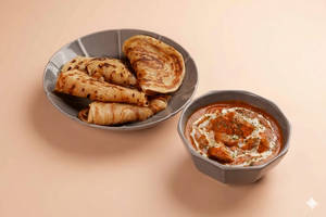Smoky Butter Chicken With Malabar Parota