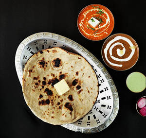 Dal Makhani + Paneer Butter Masala +6 Butter Roti