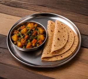 Aloo Chole Thali(Aloo Chole Sabji +5Rotidahi+Salad