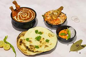 Masala chicken with 4 rumali roti