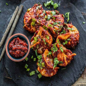 Veg Schezwan Momo (tosted)-8pcs