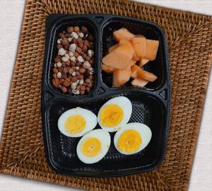 Papaya, 2 boiled eggs, boiled peanut salad