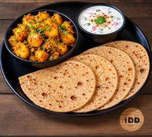 4 Tawa Roti With Masala Aloo And Raita