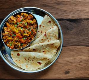 Mushroom Tarkari & Plan Roti ( 4 PC)