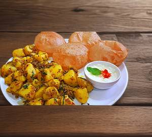 Jeera Aloo with Raita and 4 Poori