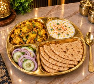 Gobi Aloo Boondi Rayata salad Thali