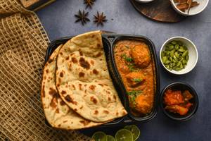 Aloo Dum + Tandoori Roti ( 2 Pcs)