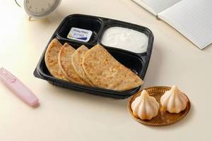 Aloo Paratha, Curd & Ukadiche Modak Combo