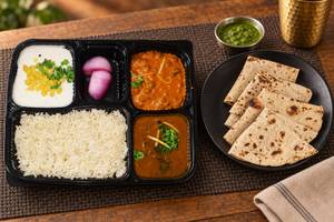 Rajma, Matar Paneer, Tawa Roti (4), Rice, Salad & Raita thalis