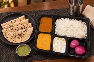 Dal Makhni, Paneer Butter Masala, Roti (4), Rice, Salad & Raita