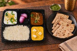 Rajma, Shahi Paneer, Tawa Roti (4), Rice, Salad & Raita thalis