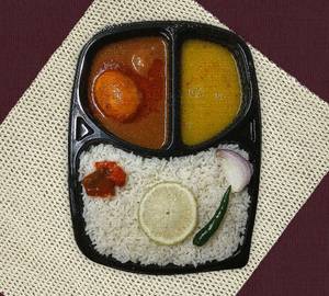 Steam Rice+ Egg Curry (1Pcs)+Dal/Sabji+ Pickles/Chutney+Lemon+ Onion