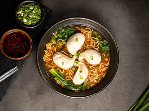 Wai Wai Noodle Chicken Soup With Momos (4 Pcs)