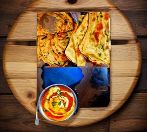 Dal Makhani, Butter Naan And Laccha Paratha Combo