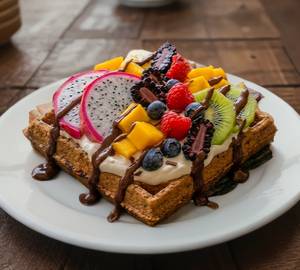 High Protein Waffle With Unsweetened Whip Cream Base Exotic Fruits Berries And Dark Chocolate Toppin