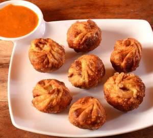 Veg Cheese Momos (Fried) (7 Pieces)
