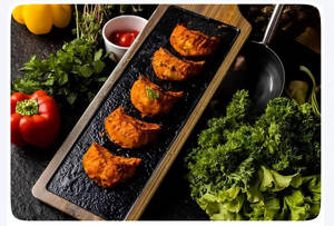 Chicken Schezwan Pan Fried Momos