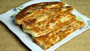 Cheese Stuffed Tawa Paratha With Sauce