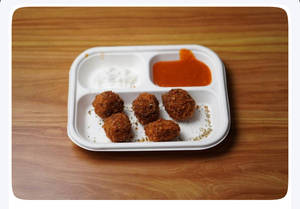Veg Butter Crispy Momos With Gravy