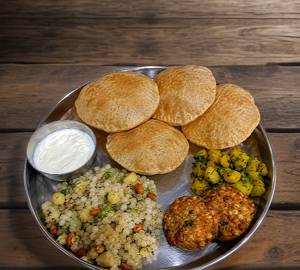 Falahari Vrat Thali.           Rs.219(Sabudana Khichdi With 2 Sabudana Vada