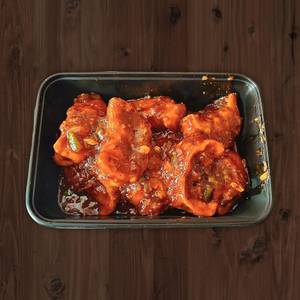 Veg Schezwan Momos (8 Pieces)