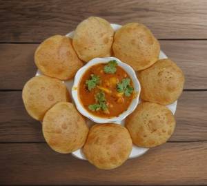 10 Poori With Hing Aloo Tamatar Sabji