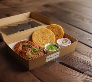 Chicken kabab 2 Paratha 2 onion green chutney 