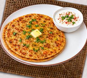 Aloo paratha with curd