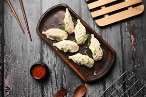 Steam momos (6 pieces)
