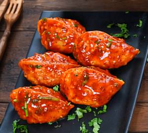 Pan Tossed Mix Veg Momo with Korean Chilli sauce 