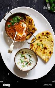 Dal Fry with 2 Butter Naan and Mix Raita
