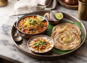 Sav Tamatar with 2 Laccha Paratha (Mini) and Boondi Raita