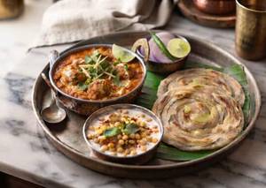 Veg Masaledar Kofta with 2 Laccha Paratha (Mini) and Boondi Raita