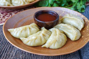 Sn-Steamed Sweet Corn Momos [8 pieces]