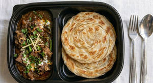 Kerala Paratha(2pc) With Mutton Curry(2pc)