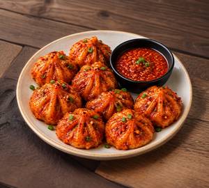 Schezwan Chicken Momo ( 8Pcs )