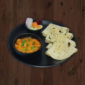 Sev tamatar sabji with tawa roti