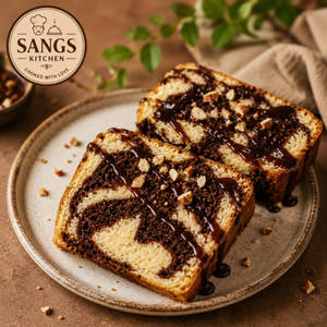 Marble Cake With Chocolates Sauce  And Nuts