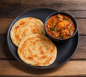 Parotta With Nadan Kozhi Curry