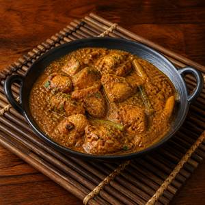 Boneless Achari Chicken Gravy