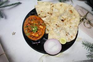 Half Boneless Chicken Curry + 2 B Naan